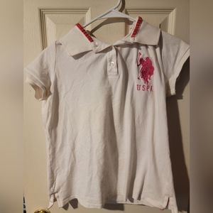 Pink and white polo